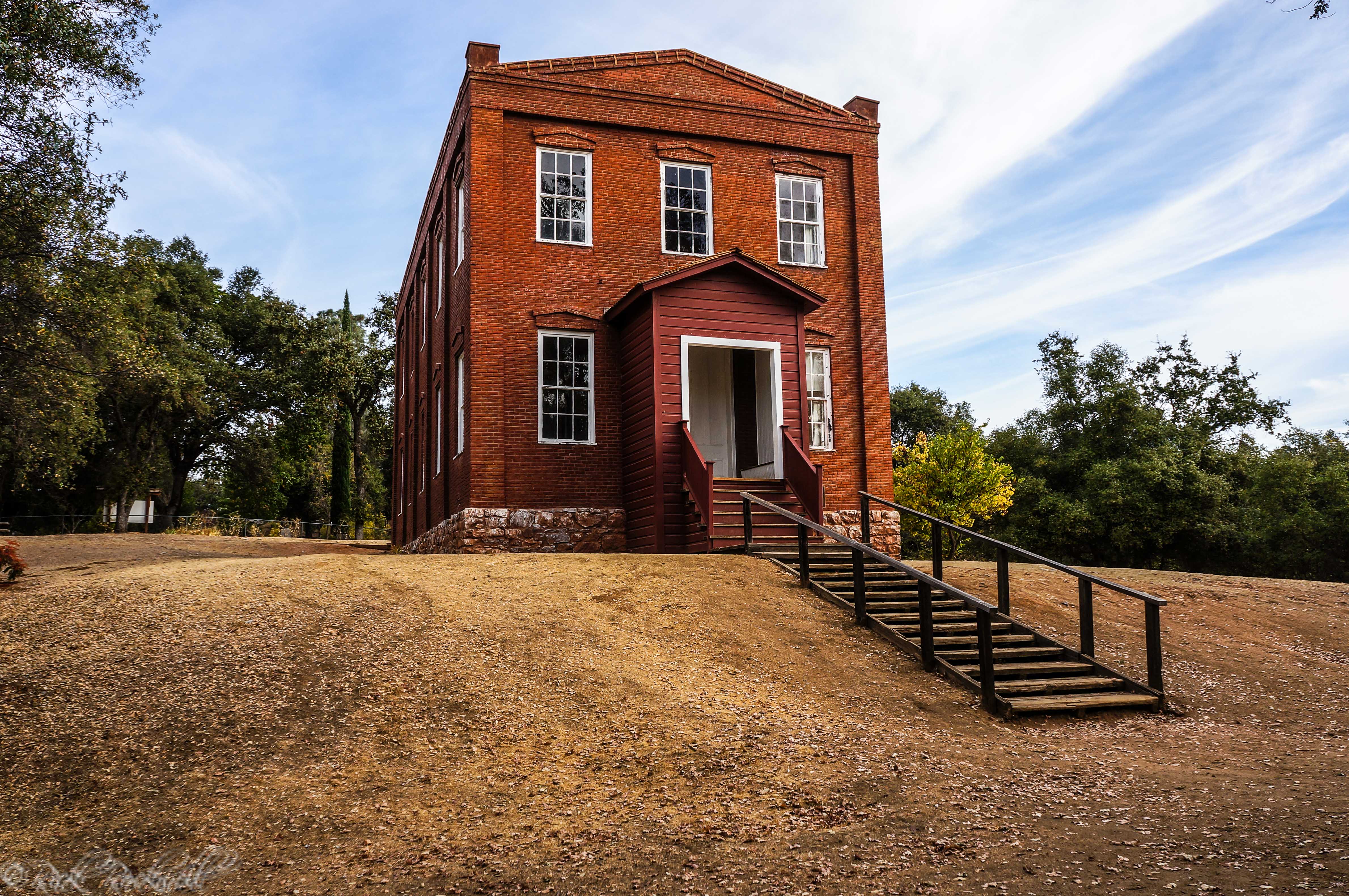 Columbia School House: the old red brick on a hill