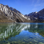 A nice view of Conflict Lake with mountains in background