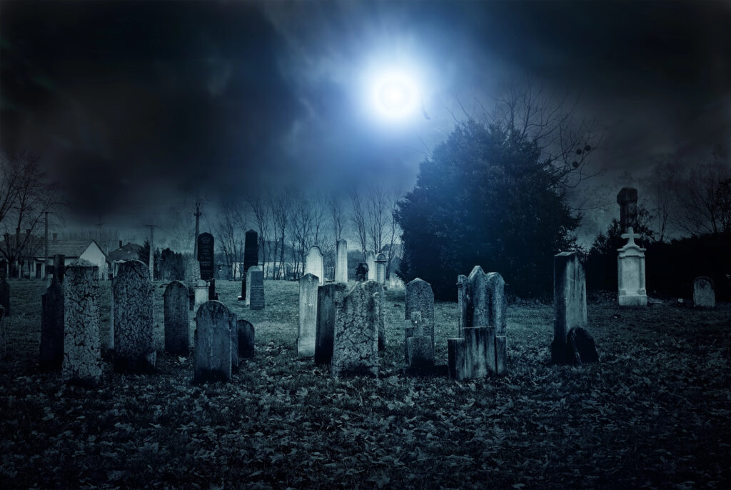 Nighttime view of a haunted cemetery