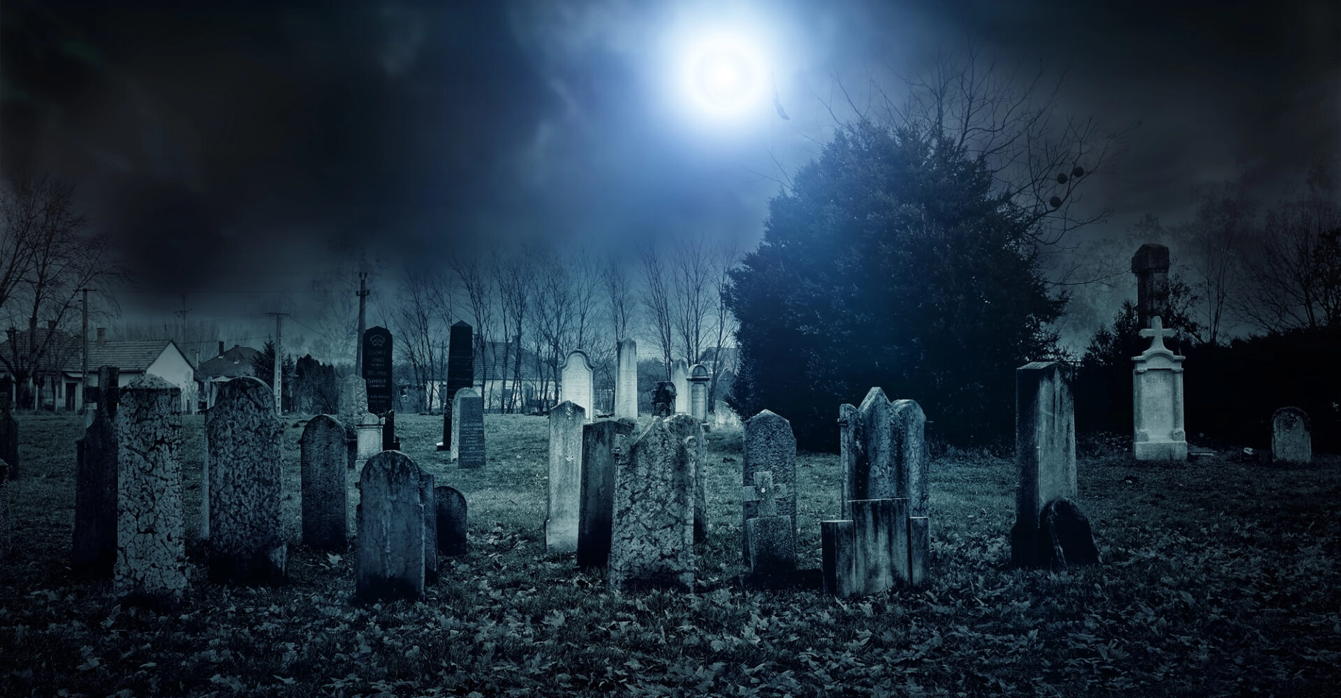 Nighttime view of a haunted cemetery