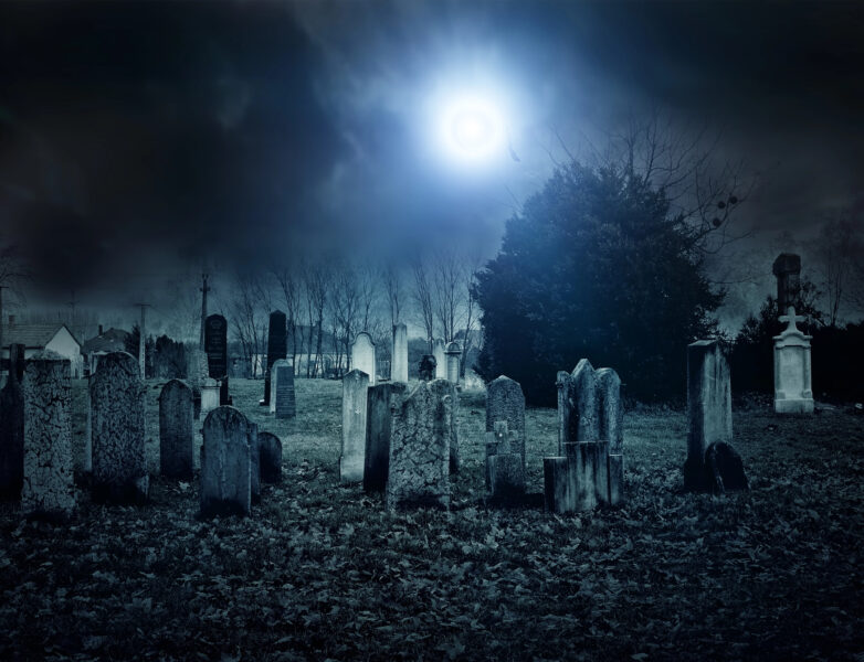 Nighttime view of a haunted cemetery